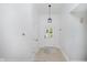 Bright foyer with tile floors, neutral walls, and modern lighting fixtures creating a welcoming entrance at 9363 Hadway Dr, Indianapolis, IN 46256