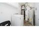 Functional laundry room with modern appliances and updated flooring, offering convenience and efficiency at 9363 Hadway Dr, Indianapolis, IN 46256
