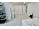 Spacious bedroom with plush carpet and a walk-in closet at 9664 Legare St # 2601, Fishers, IN 46038