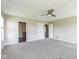 Spacious bedroom boasts soft carpeting, ceiling fan, and two entryways for convenience at 9692 Centennial Ct, Avon, IN 46123