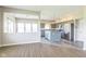 Gourmet kitchen featuring gray cabinetry, stainless steel appliances, and a large island at 9692 Centennial Ct, Avon, IN 46123