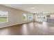 Spacious living room with wood floors and large windows offering lots of natural light at 9692 Centennial Ct, Avon, IN 46123