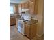 Kitchen featuring wood cabinets and laminate countertops at 1033 Cottage Ave, Columbus, IN 47201