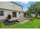 Backyard showcasing a spacious wooden deck with outdoor seating and a grill, ideal for entertaining at 10410 Trillium Ct, Noblesville, IN 46060