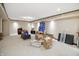 Basement area with carpet flooring, canned beverages, an armchair and boxes at 10410 Trillium Ct, Noblesville, IN 46060