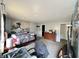 Bedroom with carpet, dresser and a decorative tapestry hanging on the wall at 10832 Tealpoint Dr, Indianapolis, IN 46229