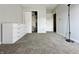 Bedroom featuring carpeted floors, a closet and a dresser with neutral paint at 10832 Tealpoint Dr, Indianapolis, IN 46229