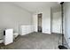 Bedroom featuring carpeted floors, a closet and a dresser with neutral paint at 10832 Tealpoint Dr, Indianapolis, IN 46229