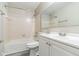 Bathroom with a bathtub, shower, toilet, and modern white vanity at 11114 Wismar Dr, Indianapolis, IN 46235