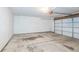 A spacious garage with a concrete floor and garage door at 11114 Wismar Dr, Indianapolis, IN 46235