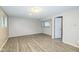 A bright living room with wood-style flooring and neutral walls at 11114 Wismar Dr, Indianapolis, IN 46235
