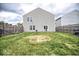 A spacious backyard featuring a grass area and a fence at 11303 Cuyahoga Dr, Indianapolis, IN 46235