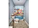 Small bathroom featuring a toilet and shower/tub with a Paw Patrol themed shower curtain at 11303 Cuyahoga Dr, Indianapolis, IN 46235