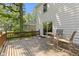 Exterior view of the deck featuring an outdoor seating set and a well-maintained backyard at 11461 N College Ave, Carmel, IN 46032