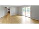 Open concept living room features access to kitchen and wood deck at 11461 N College Ave, Carmel, IN 46032