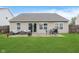 A patio offers a cozy seating area and dining space, perfect for outdoor relaxation and entertainment at 11521 Short Iron Ln, Indianapolis, IN 46235