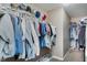 Walk-in closet features ample storage space with organized shelves and rods, perfect for keeping your wardrobe tidy at 11521 Short Iron Ln, Indianapolis, IN 46235