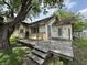 Spacious backyard deck with stairs perfect for outdoor entertaining and relaxation at 1201 N Canal St, Alexandria, IN 46001