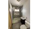 Bathroom featuring tub, shower, vanity and tiling at 1201 N Canal St, Alexandria, IN 46001