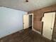 Bedroom with hardwood floors, blue walls, and wood trim details at 1201 N Canal St, Alexandria, IN 46001