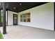 Covered back porch with black pillars at 12594 Pasco St, Fishers, IN 46038