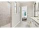 Bathroom features a step-in shower and a doorway leading to the bedroom at 12594 Pasco St, Fishers, IN 46038