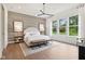 Beautifully staged bedroom with large windows, natural light, and elegant decor at 12594 Pasco St, Fishers, IN 46038