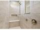 Step-in shower features a bench and a built-in shampoo niche at 12594 Pasco St, Fishers, IN 46038