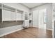 Large walk-in closet offers custom shelving and drawers, with a view of the bedroom at 12594 Pasco St, Fishers, IN 46038