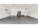Spacious two car garage featuring sealed flooring and ample storage at 13091 Duval Dr, Fishers, IN 46037
