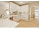 Well-appointed kitchen with white cabinets, quartz countertops, stainless appliances, and a stylish backsplash at 13091 Duval Dr, Fishers, IN 46037