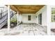A shaded patio beneath the deck creates a peaceful outdoor space at 13091 Duval Dr, Fishers, IN 46037