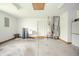 Spacious garage featuring white walls, sealed concrete floors and storage space at 1324 N Stewart Rd, Anderson, IN 46012
