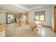 Bright kitchen with wooden cabinets, stainless steel appliances, and a breakfast nook area at 1324 N Stewart Rd, Anderson, IN 46012