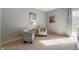 Cozy seating area with patterned chairs, a small side table, and soft natural light at 1325 Alimingo Dr, Indianapolis, IN 46260