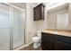 Bathroom with a glass enclosed shower, granite countertop, and cabinet at 1412 Huntzinger Blvd, Pendleton, IN 46064
