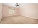 Bedroom featuring neutral walls, carpet flooring, natural light, and a ceiling fan at 1412 Huntzinger Blvd, Pendleton, IN 46064