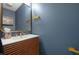 Stylish powder room features modern vanity, sleek fixtures and unique design at 1412 Huntzinger Blvd, Pendleton, IN 46064