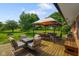 Outdoor patio with a grill, seating, and an inviting gazebo area for entertaining at 1506 Bowman Dr, Greenfield, IN 46140