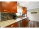Beautiful kitchen showcasing granite countertops, stainless steel appliances, and stylish cabinetry at 1506 Bowman Dr, Greenfield, IN 46140