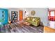 Cozy living room featuring hardwood floors, neutral-toned furniture, and stylish decor at 1506 Bowman Dr, Greenfield, IN 46140
