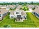 Aerial view of the home showcasing the expansive yard and outdoor living space at 15097 Thoroughbred Dr, Fishers, IN 46040