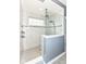Modern bathroom features glass enclosed shower with multiple shower heads and custom tile work at 15097 Thoroughbred Dr, Fishers, IN 46040