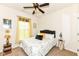 Charming bedroom featuring natural light and ceiling fan providing a comfortable and inviting atmosphere at 15097 Thoroughbred Dr, Fishers, IN 46040