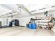 Spacious garage with ample storage, perfect for vehicles and hobbies at 15097 Thoroughbred Dr, Fishers, IN 46040