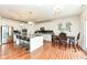 Spacious kitchen with stainless steel appliances, granite countertops, an island with seating, and a dining area at 15097 Thoroughbred Dr, Fishers, IN 46040