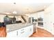 Open-concept kitchen with large island, granite countertops, and stainless steel appliances at 15097 Thoroughbred Dr, Fishers, IN 46040