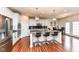 Modern kitchen with stainless steel appliances, granite countertops, and an island with seating at 15097 Thoroughbred Dr, Fishers, IN 46040