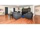 Charming living room featuring hardwood floors, a fireplace, and stylish furnishings at 15097 Thoroughbred Dr, Fishers, IN 46040