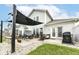 Charming patio area with a grill, fire pit, and ample seating for entertaining guests at 15097 Thoroughbred Dr, Fishers, IN 46040